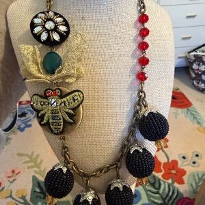 Elegant Beaded Necklace with Red and Black Accents